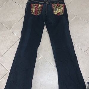 baby phat jeans dark blue and pink and gold details on back pockets, size 11